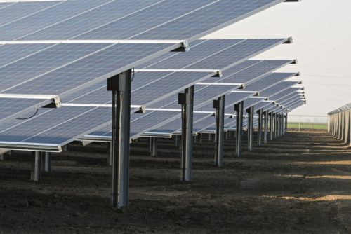 Solar GroundMounts Solar Structure next to field