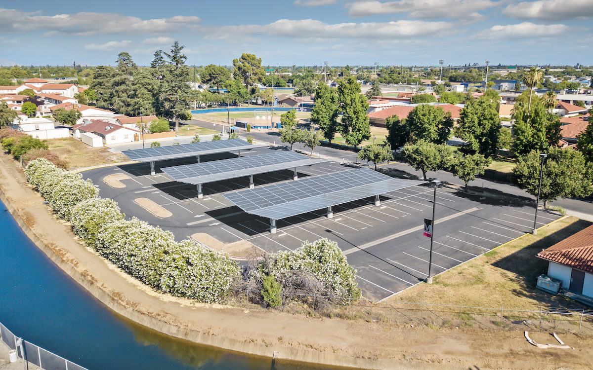 Inverted Cantilever commercial solar carport, solar panel canopy, school parking lot